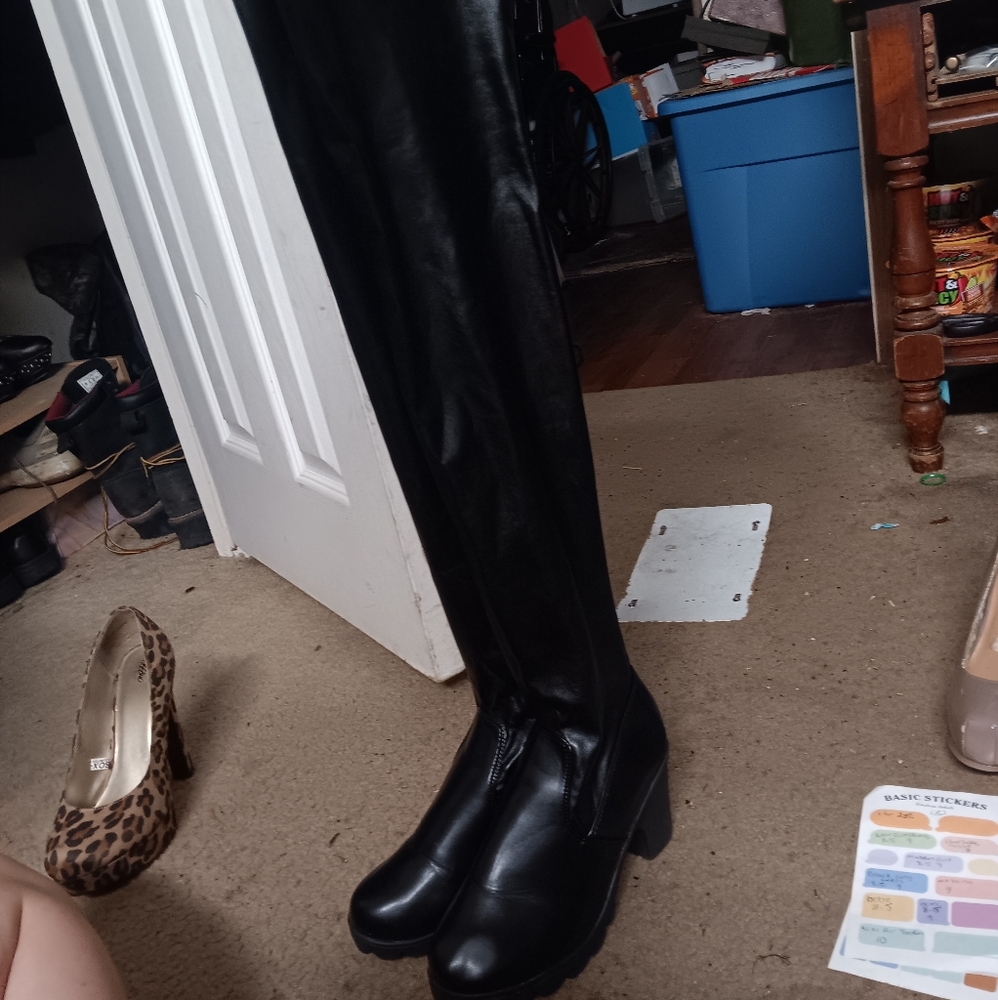 Black leather tall heel boots